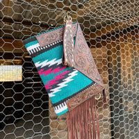 Saddle blanket bag with tooled leather 